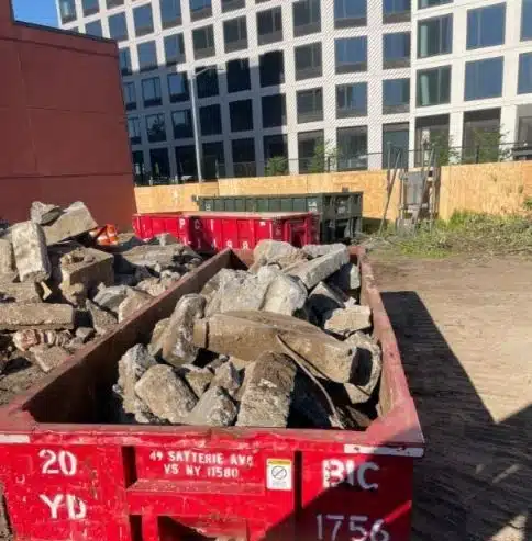 Construction Dumpster Rental Manhattan: Construction dumpster rental in Manhattan for easy waste disposal on job sites. Photo taken February 2024.
