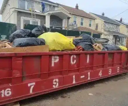 Urban dumpster placement with pedestrians and traffic in NYC