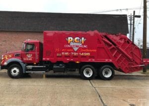 Close-up of a roll-off dumpster with a price tag, illustrating pricing options for dumpster rentals